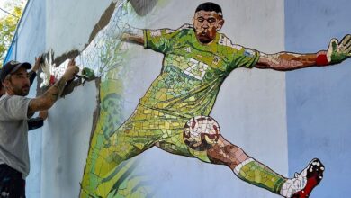 Photo of La historia del mural colosal que conmovió a Dibu Martínez